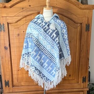 Blue and white poncho